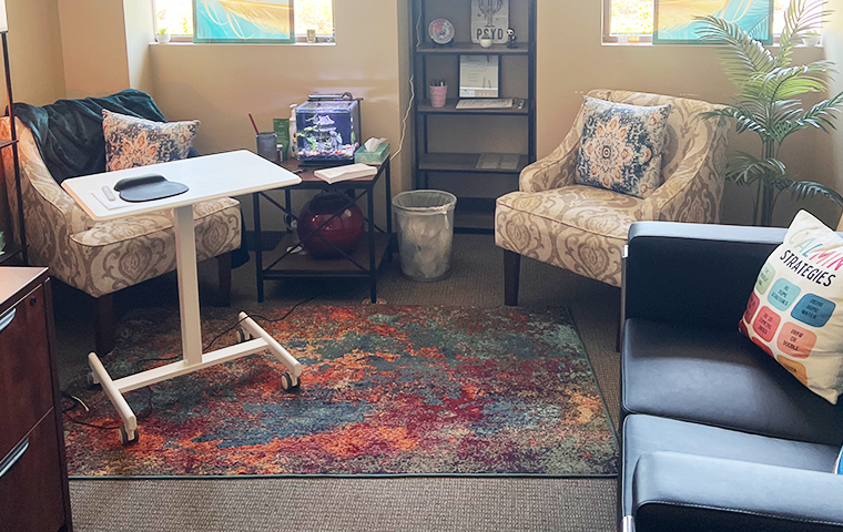 A licensed clinician conducting an individual counseling session for mental health treatment at SMHWI in Arizona