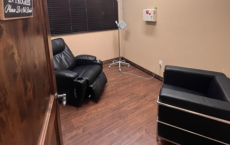 TMS therapy device in use at SMHWI mental health clinic
